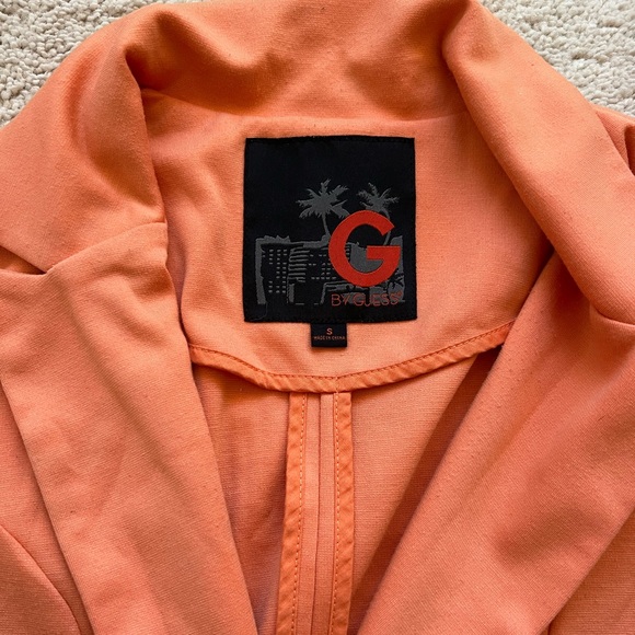 Peach colored peplum style blsxer - Picture 2 of 4